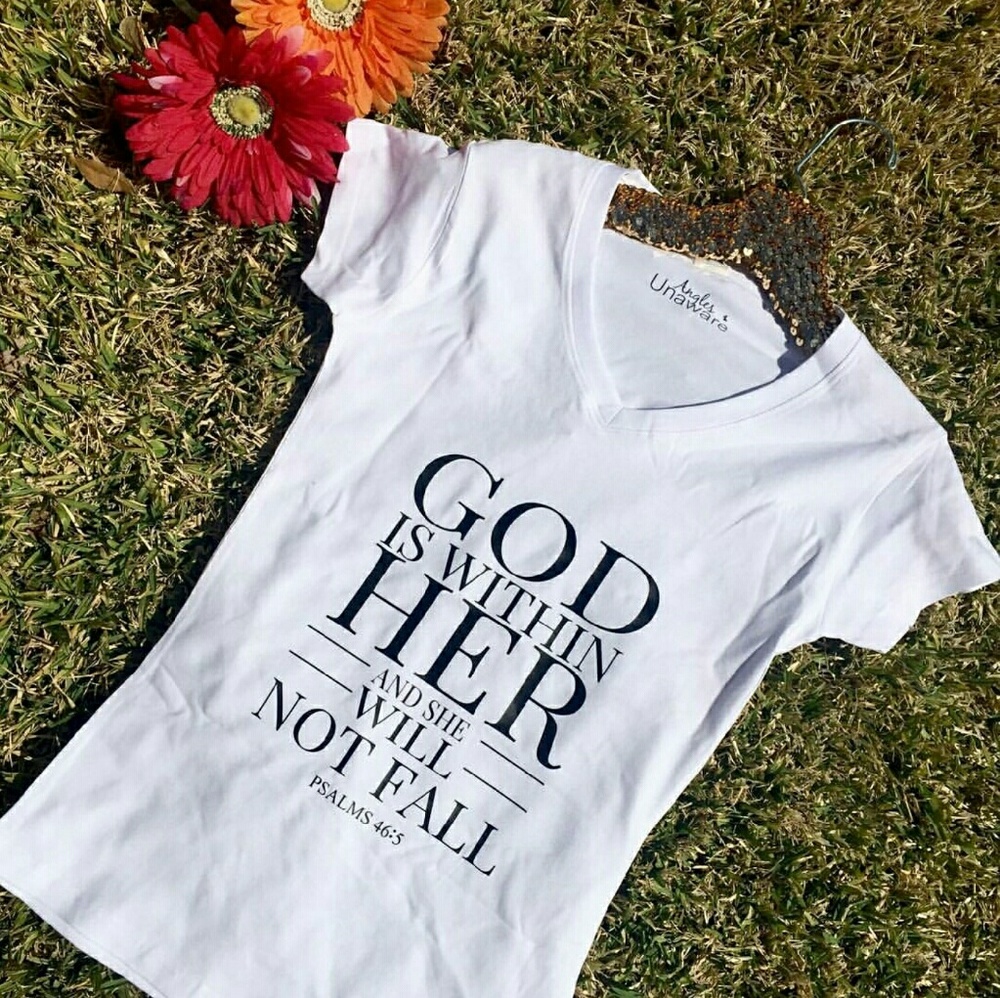 Original design graphics. “God is with her” T-shirt. Size medium.
